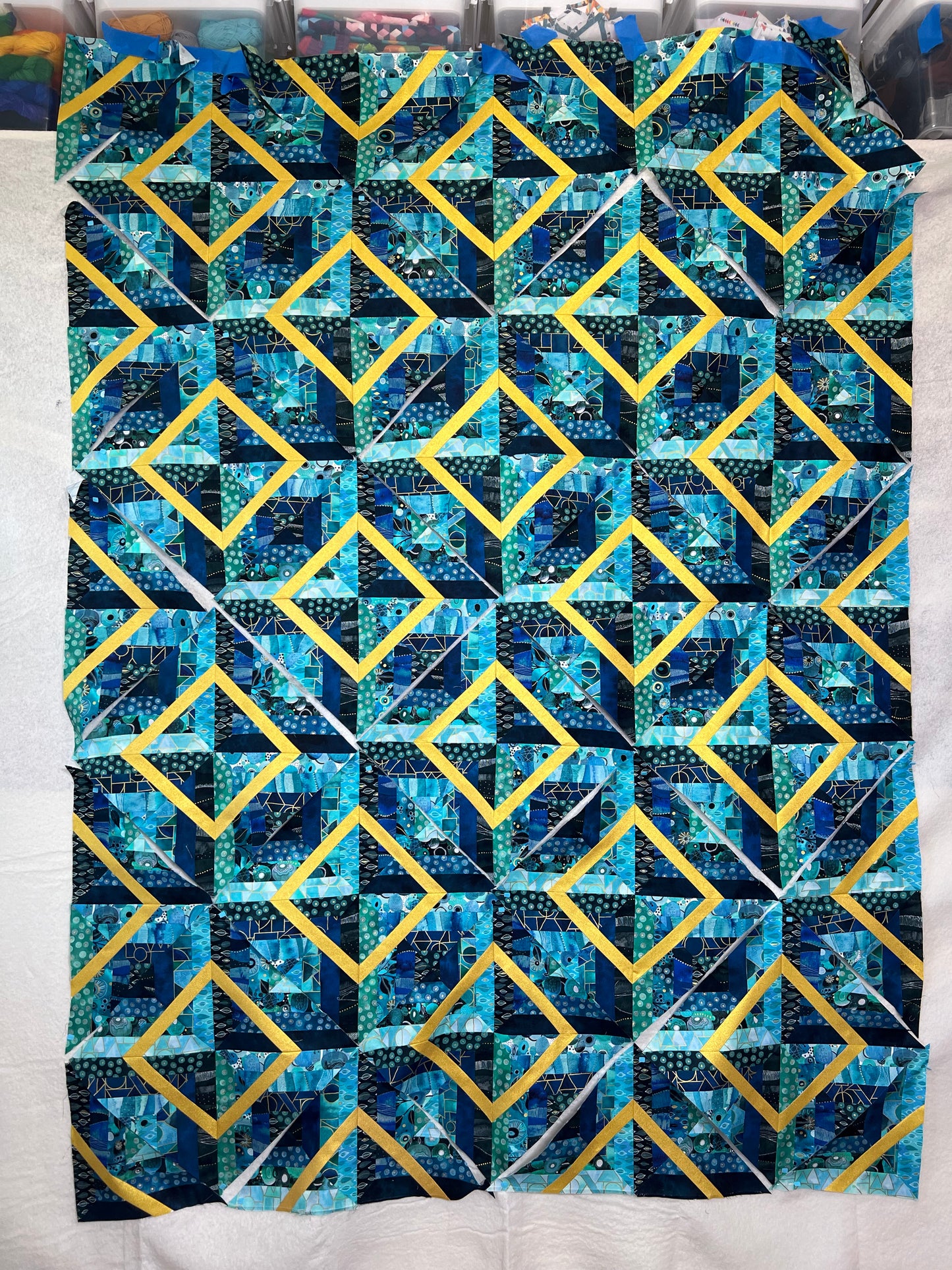 On Point Quilt Kit - Fabric (16 Half Yard Cuts of Ebb & Flow + 1 Full Yard Gold Metallic) + Pattern